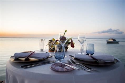 Romantic Dinner Setting on the Beach at Sunset. Stock Image - Image of ...