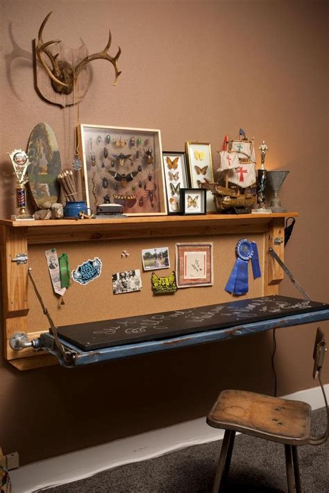 This former truck tailgate has been refurbished into a desk for a youngster's adventurous room ...