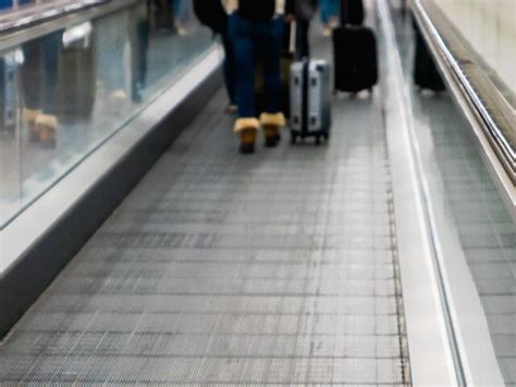 PHOTOS: Woman Loses Leg in Freak Accident on Thai Airport Moving Walkway