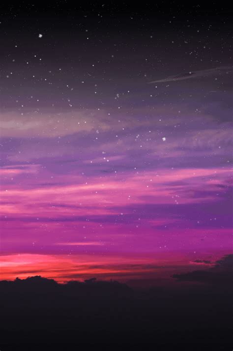 the night sky is purple and pink with stars