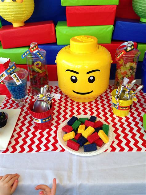 Lego themed party table. Candy melt Lego blocks. Yummy. | Lego themed party, Party themes, Party ...