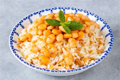 Premium Photo | Traditional turkish cuisine. kuru fasulye . haricot beans, rice and beans ...