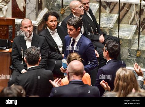 French Prime Minister Gabriel Attal walks down the podium after he announced the general ...