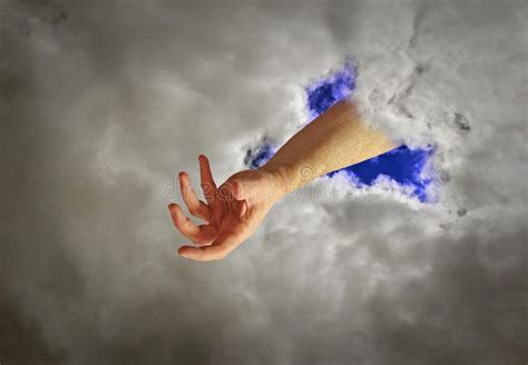 Hand of god. Concept photo of hand of god coming through break in the ...