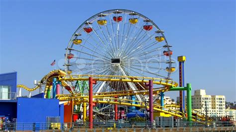 Santa Monica Pier Ferris Wheel And Roller Coaster videos 11235151 | HD Stock Footage