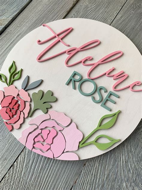 Name sign for nursery girl with flowers Baby room round name | Etsy