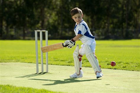 Boy Playing Cricket Stock Photo - Download Image Now - iStock