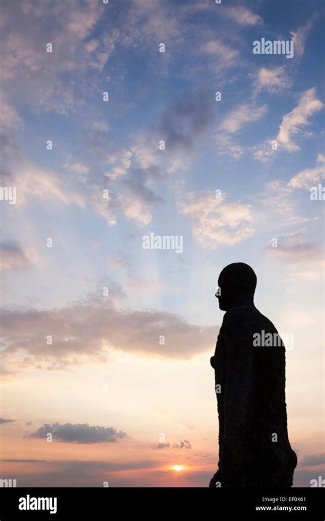 Antony gormley another place sunset hi-res stock photography and images - Alamy