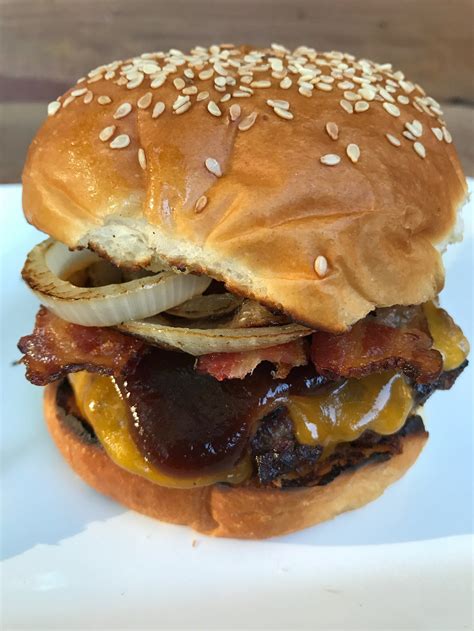 Western Bacon Cheeseburgers | Tangy bbq sauce, Bacon cheeseburger, Grilled onions