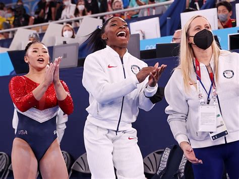 Simone Biles was caught on a hot mic encouraging Team USA to 'kick ass ...