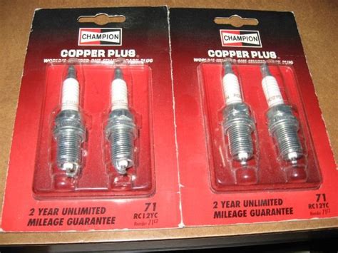 4 New Champion RC12YC 71 Spark Plugs