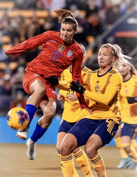 Tobin Heath #17 (left) of the US National Team controls the ball against Sweden on November 7 ...