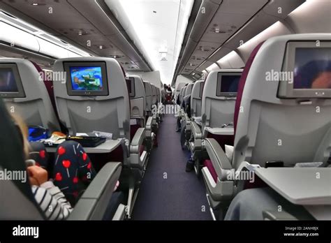 Doha, Qatar - Nov 24. 2019. Salon Airbus A320 Economy class of Qatar ...