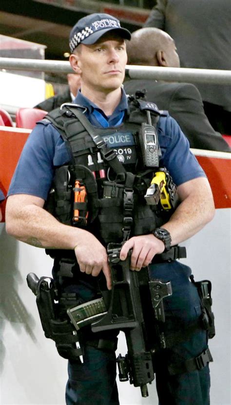 Pictured: Armed police outside Wembley Stadium for England v France ...