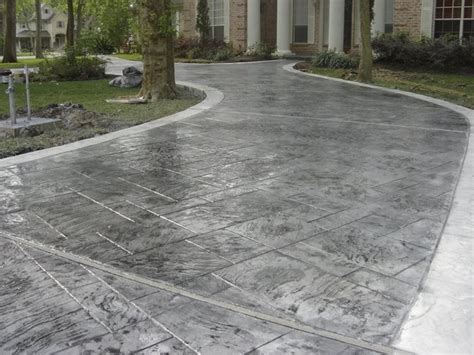 Concrete driveway pavers vs stamped concrete driveway