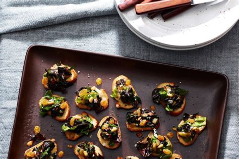 Olive-Oil Toasts With Greens, Pine Nuts, and Raisins | Recipe | Pine ...