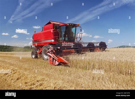 Red combine harvester hi-res stock photography and images - Alamy