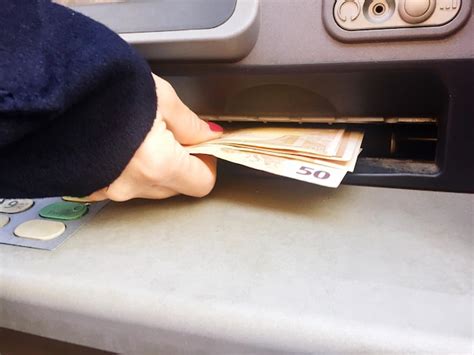 Premium Photo | Close-up of hand holding cash