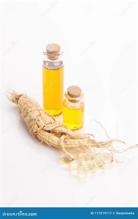 Extract of ginseng root stock image. Image of extract - 117219117