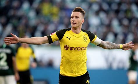 WOLFSBURG, GERMANY - NOVEMBER 03: Marco Reus of Dortmund celebrates after scoring his team's ...