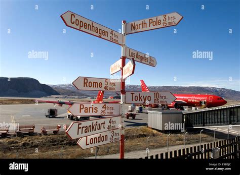 Distance signs at Kangerlussuaq Airport in Greenland Stock Photo - Alamy