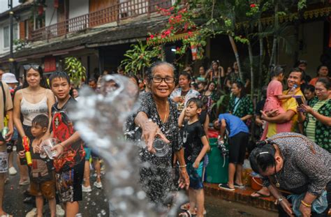 Laos celebrates new year in full tilt with pandemic precautions aside