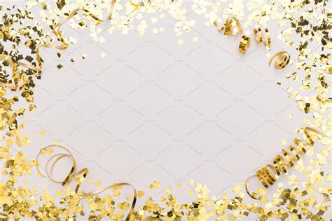 Sparkling frame of gold confetti on | Stock Photos ~ Creative Market