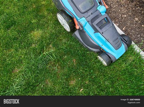 Electric Lawn Mower Image & Photo (Free Trial) | Bigstock