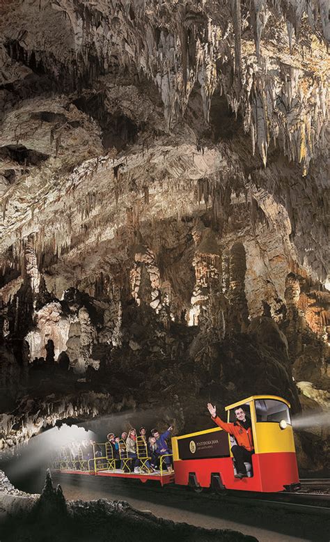 Train with visitors in Postojna cave, by Postojnska jama | Postojna ...