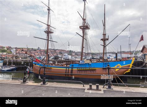 The HMS Endeavour replica ship in the harbour at Whitby,North Yorkshire,England,UK Stock Photo ...