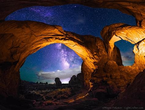 The Double Arch under the night sky Arches NP Utah photo by Wayne Pinkston - Photorator