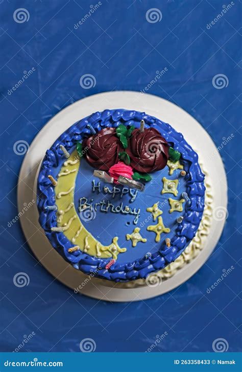 Beautiful Blue Happy Birthday Cake with Silver Number 13 on a Blue Background. Top View ...