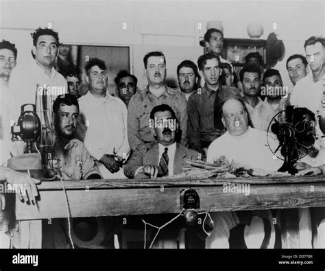 Mexican President Lazaro Cardenas meeting with oil labor leaders. On March 18, 1938, with the ...