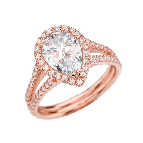 Diamond Halo Pear-Shaped Cubic Zirconia Center Engagement Ring in Rose Gold