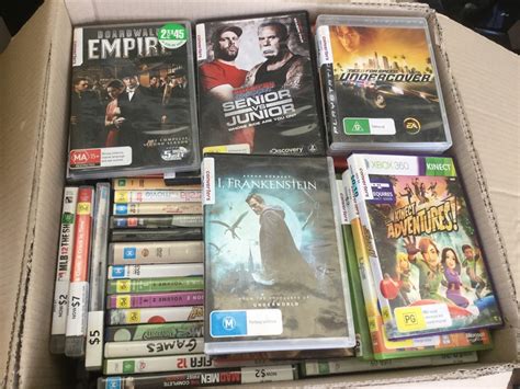 Assorted DVDs & Video Games, Various TV Shows/Movies & Video Games, Quantity of 1 Box