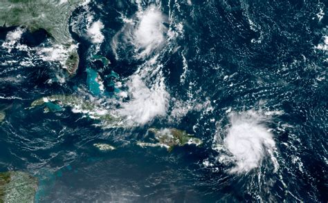 Maps predicting Hurricane Dorian's path, timing, and wind speeds