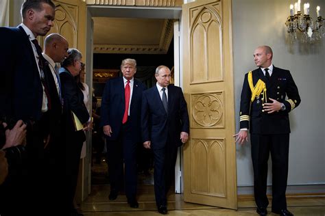 In pictures: Trump meets with Putin