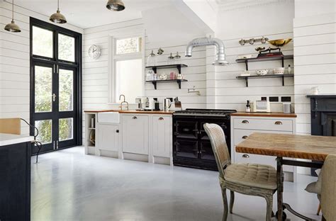 Shiplap wood paneling in a classic English kitchen remodel