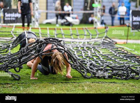 Crawling obstacles at Action run 2017 obstacle race run in the city of ...