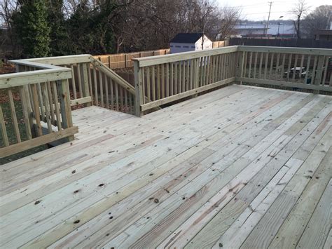 Standard 5/4" pressure treated deck w/ wood wrap & wood handrail. Deck ...