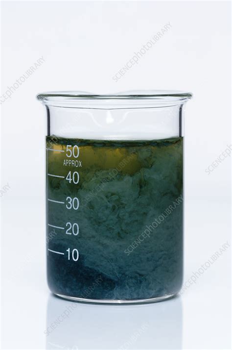 Iron(II) hydroxide precipitate - Stock Image - C044/9206 - Science Photo Library