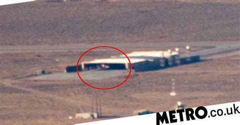 Mysterious trianglular shape spotted inside Area 51 hanger | Metro News