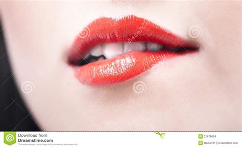 Biting lips stock photo. Image of light, lipstick, glossy - 31678654