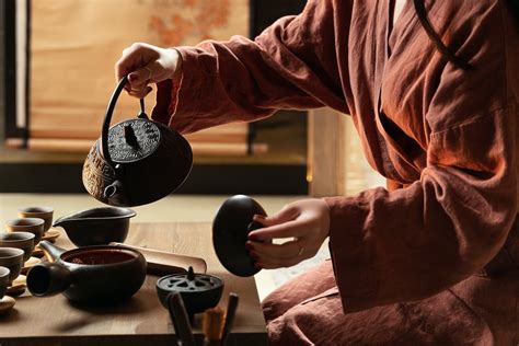 Person Pouring Tea for a Tea Ceremony · Free Stock Photo