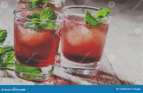 Alcoholic Cocktail With White Rum Bacardi, Campari, Vermouth, Mi Stock Photo - Image of ...