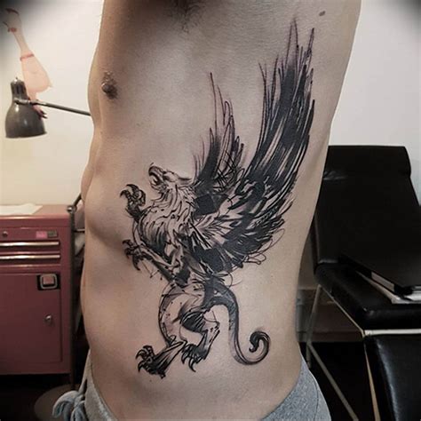 Griffin tattoo meaning: drawing history, photo examples, sketches, facts