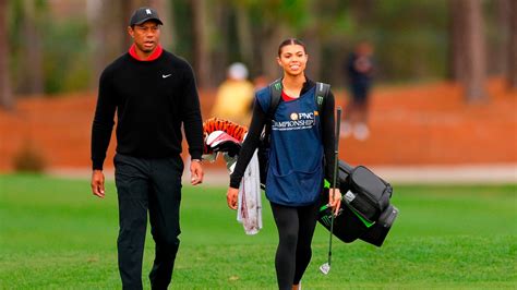 Tiger Woods' daughter Sam serves as his caddie for 1st time - ABC News