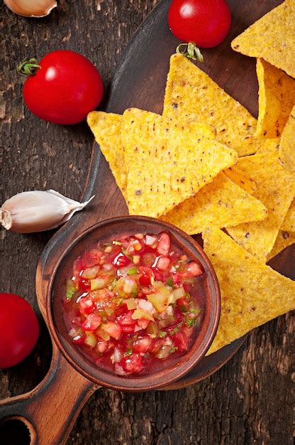 Free Photo | Mexican nacho chips and salsa dip in bowl