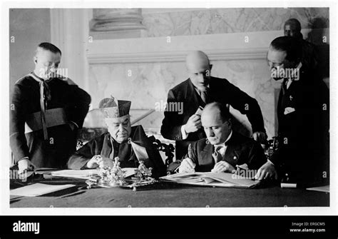 Mussolini signing the Lateran Treaty, 1929. 40th Prime Minister of Stock Photo: 83339765 - Alamy