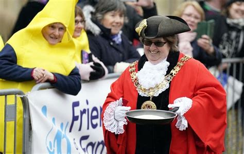 In Pictures: Pancake races and unusual ball games mark Shrove Tuesday ...